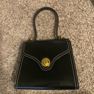 Coco D ESTE Italian dark blue hand bag. In great condition.